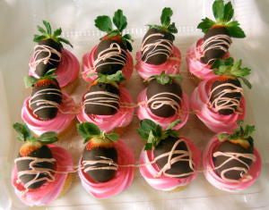 Cupcakes topped with Chocolate Dipped Strawberries