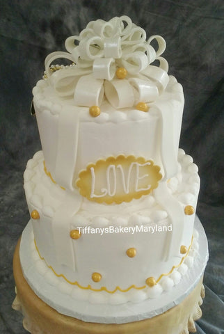 Celebration Tier Cake with Bow Topper