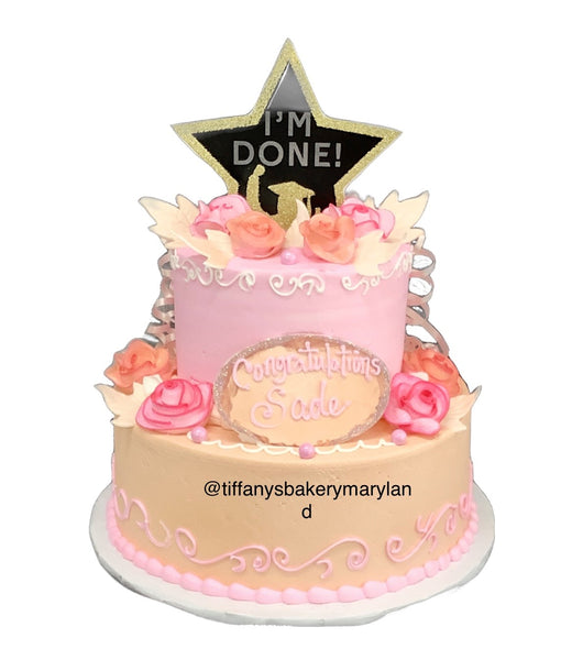 Graduation Celebration Tier Cake with pastel flowers