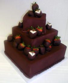 Tuxedo Strawberries on Chocolate Cake