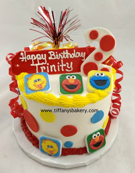Sesame Street Character Rings on Round Cake.
