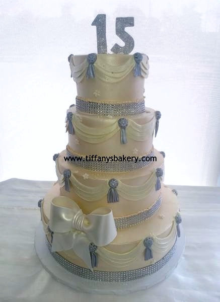 Swags and Tassels 4 Tier Quinceañera Cake
